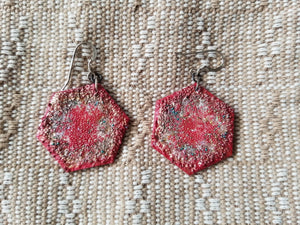 Red hexagon earrings made in Kansas City by Eugenia Ortiz