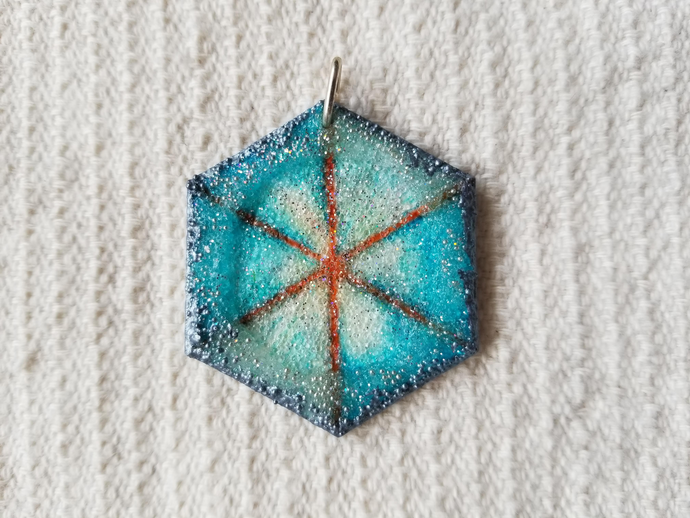 Blue hexagon pendant made in Kansas City by Eugenia Ortiz
