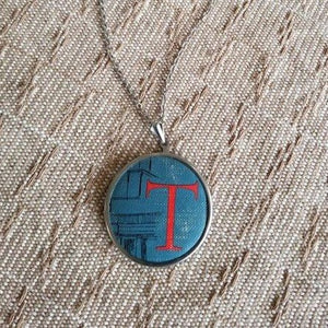 Repurposed Book Cover Necklace, blue with red letter T