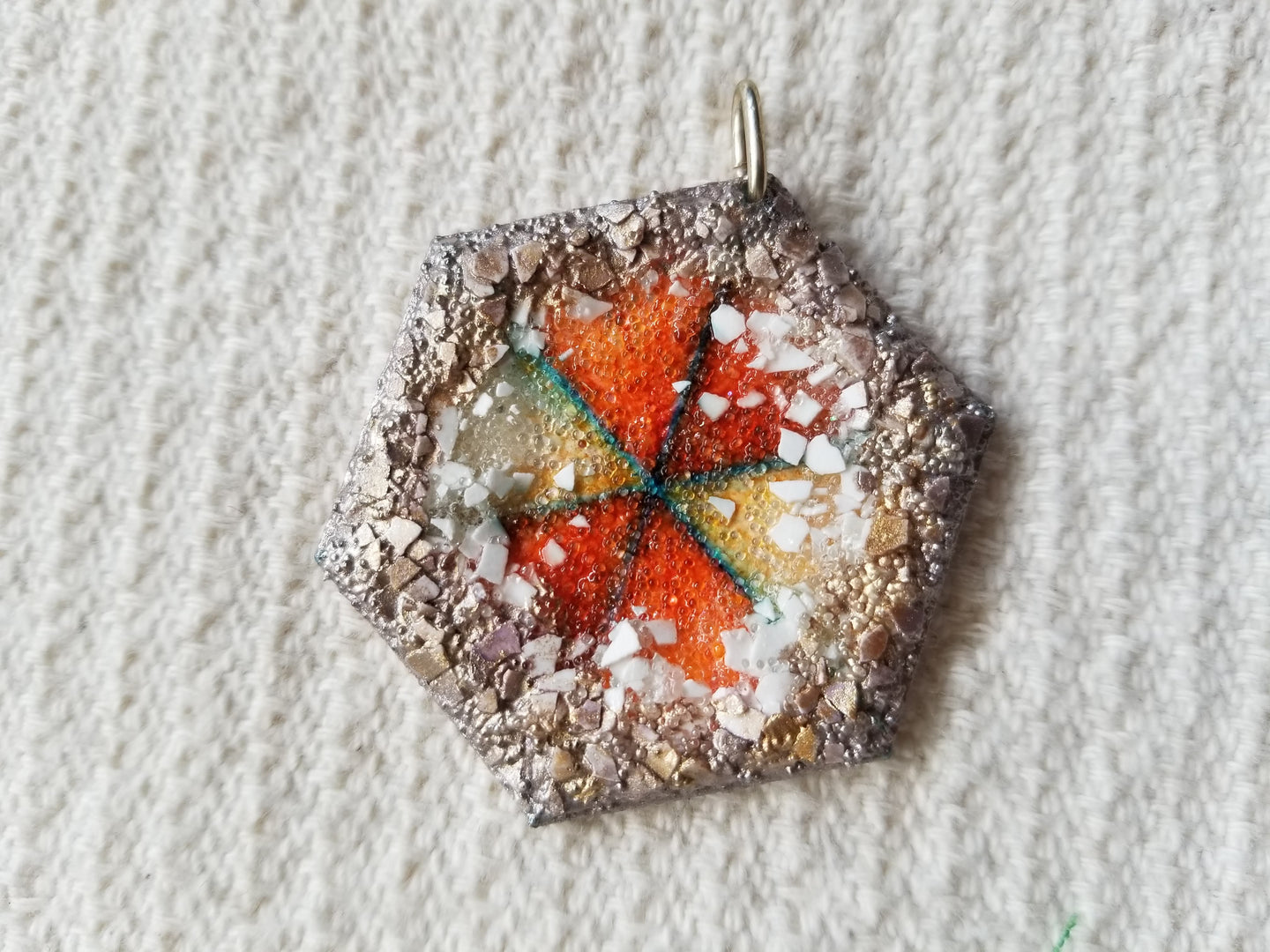 hexagonal pendant handmade by Eugenia Ortiz