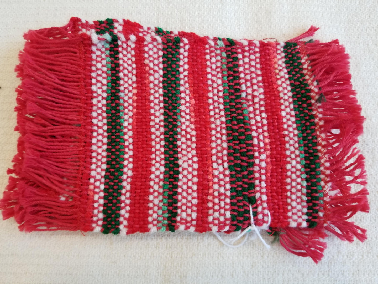 Woven coaster red stripes handmade by Rainbow Acres Ministry, Arizona. Set of 2