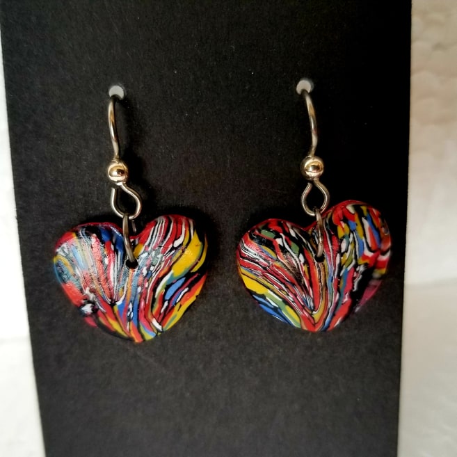 Poly Clay swirled heart dangly earrings by Laura Meade